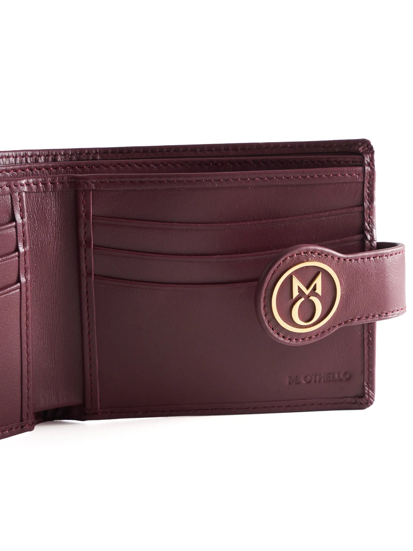 Burgundy leather wallet with 'M. Othello' branding on a light background