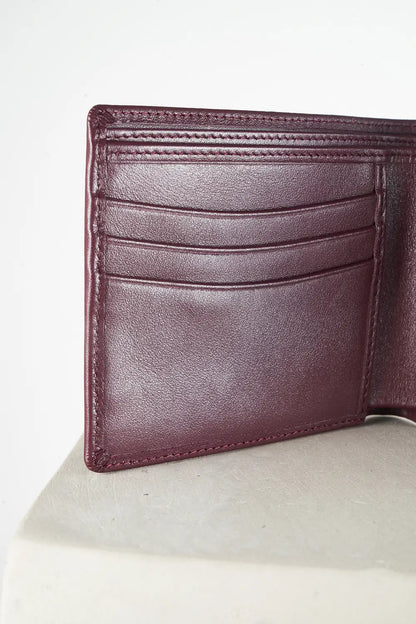 Burgundy bi-fold wallet with brand logo on a light background