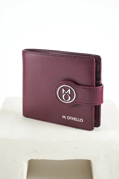 Burgundy bi-fold wallet with brand logo on a light background