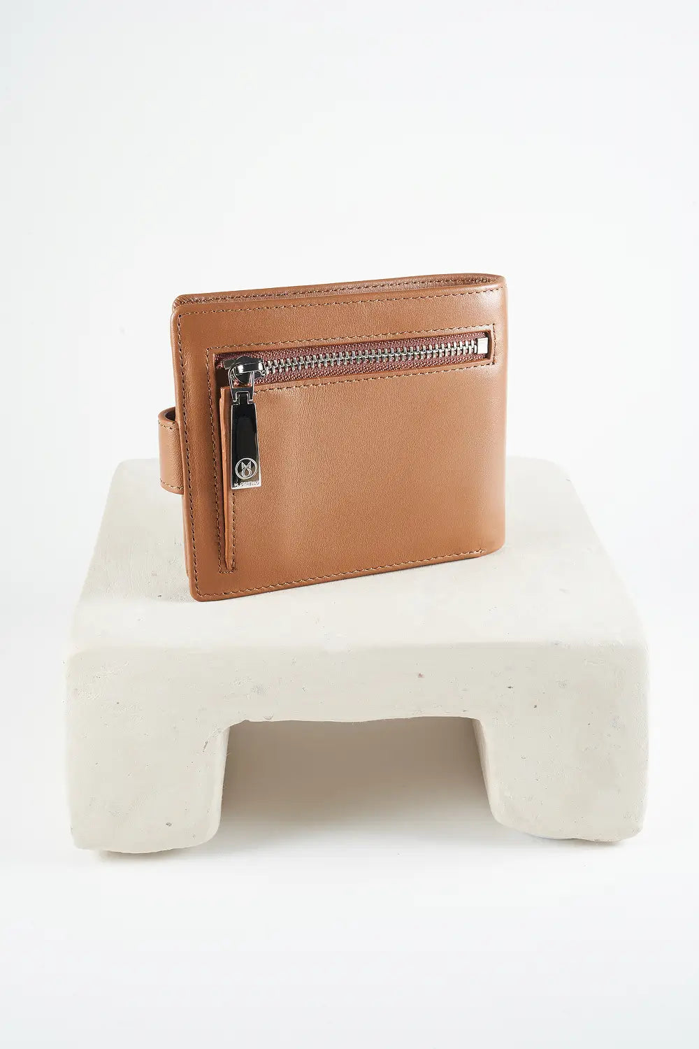 Brown bi-fold wallet with brand logo on a light background