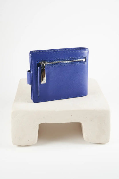Blue bi-fold wallet with brand logo on a light background