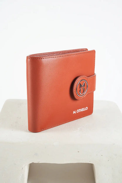 Brown bi-fold wallet with brand logo on a light background