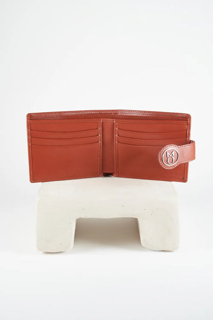 Brown bi-fold wallet with brand logo on a light background