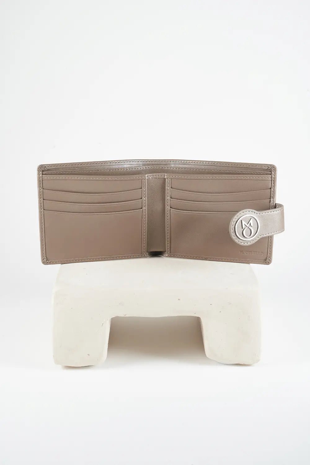 Gray bi-fold wallet with brand logo on a light background
