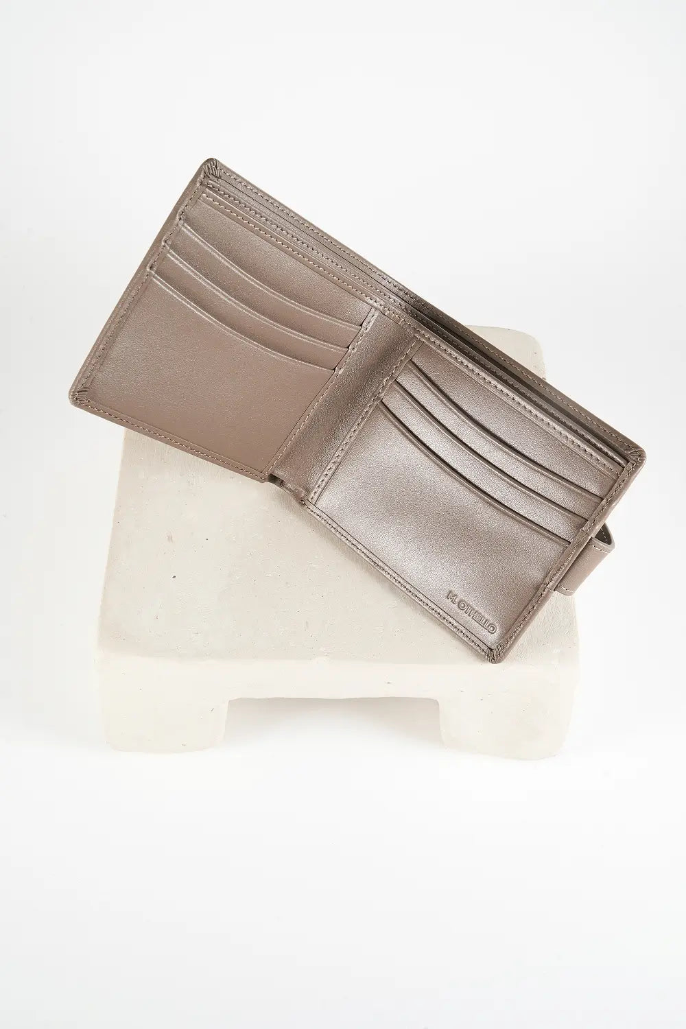 Gray bi-fold wallet with brand logo on a light background