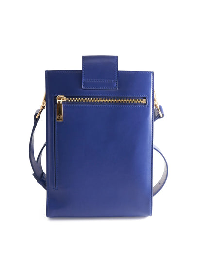 Cobalt Blue Crossbody Bag with 'M. Othello' branding on a light background