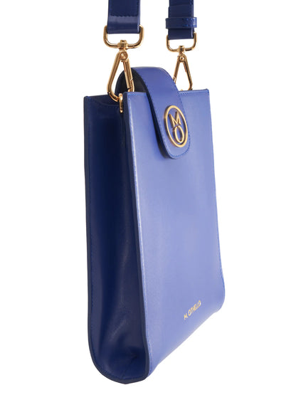 Cobalt Blue Crossbody Bag with 'M. Othello' branding on a light background