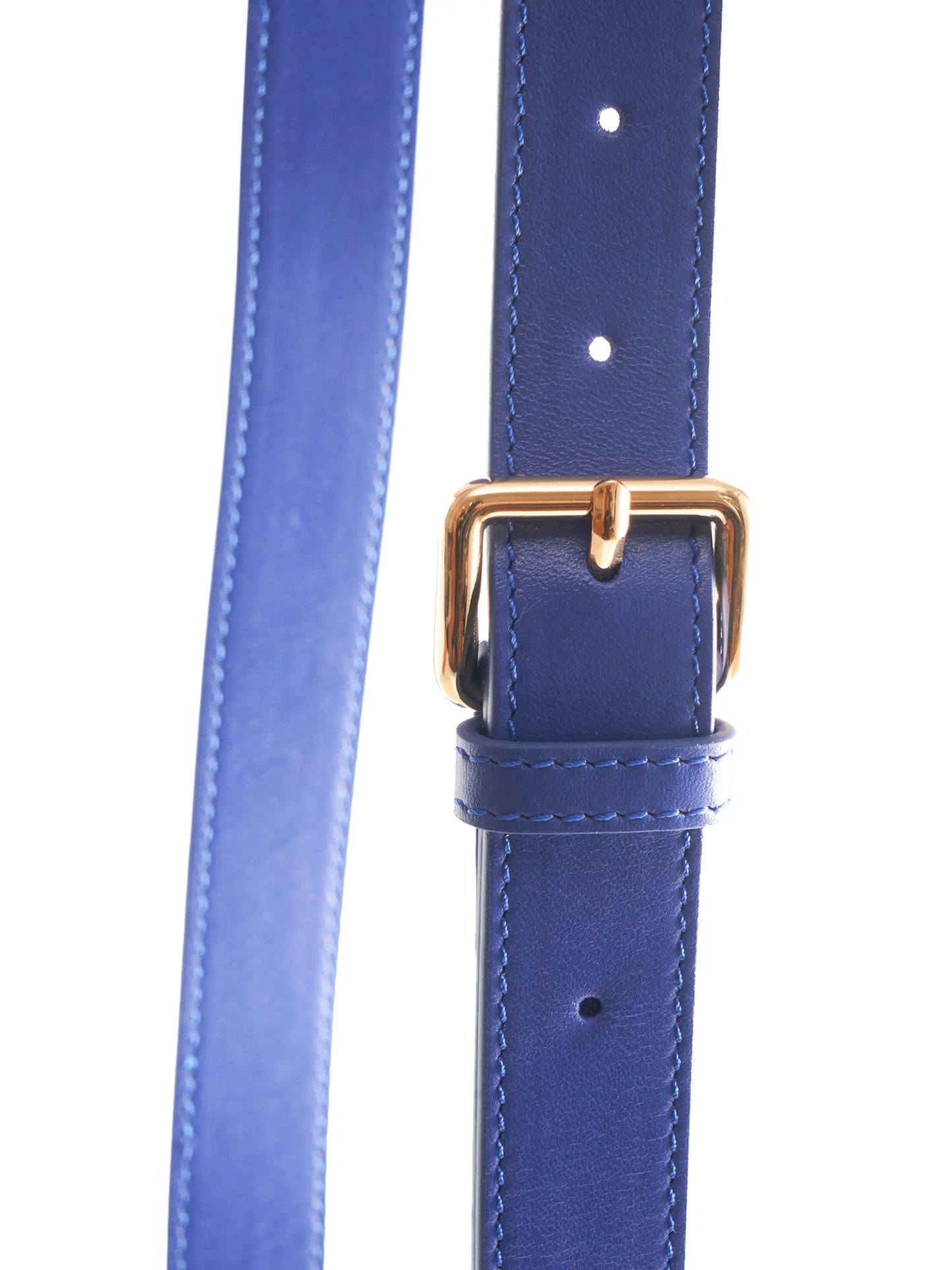 Cobalt Blue Crossbody Bag with 'M. Othello' branding on a light background