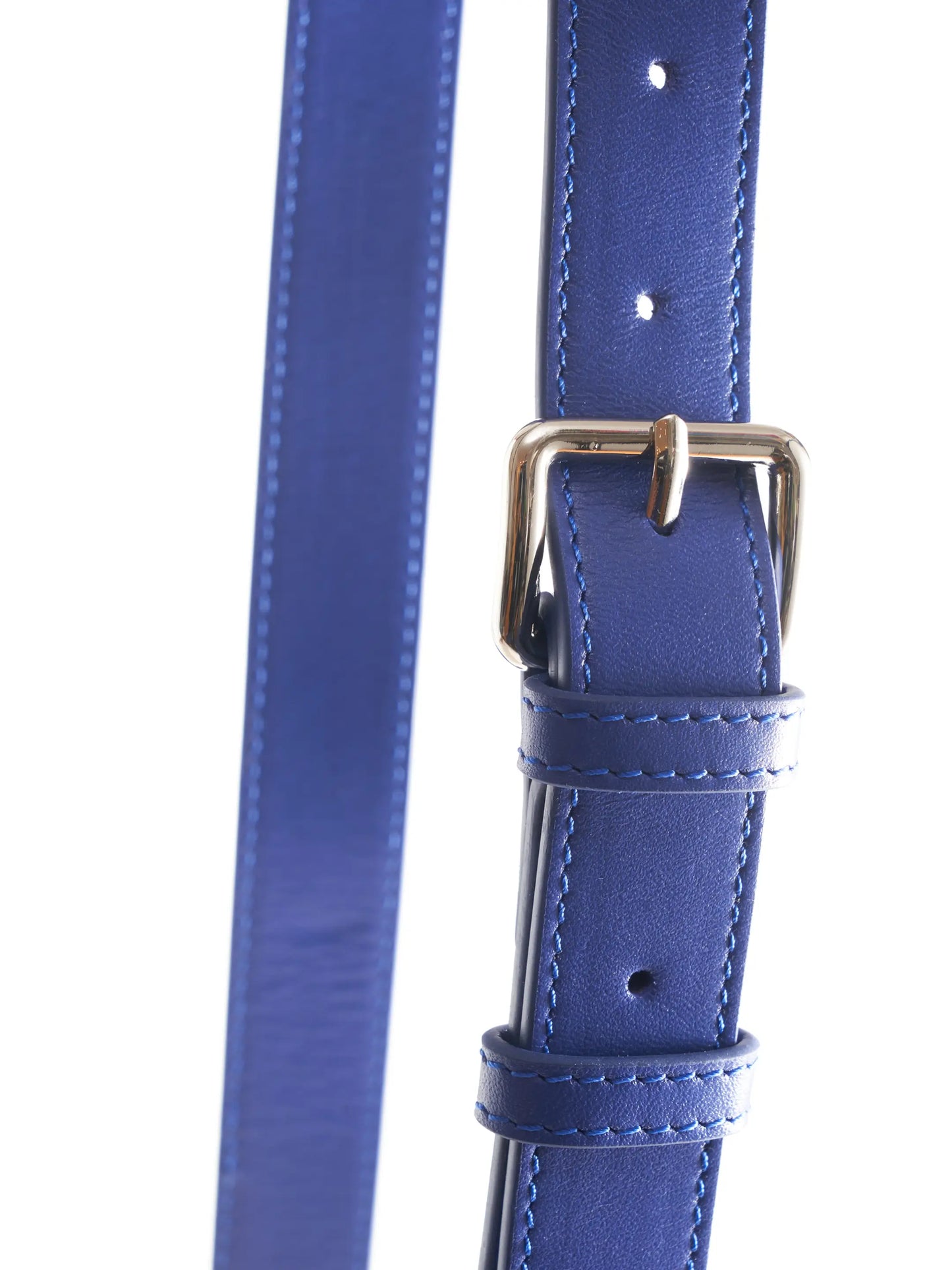 Cobalt Blue Crossbody Bag with 'M. Othello' branding on a light background