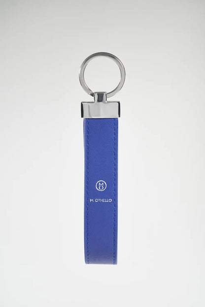 Blue keychain with silver ring on a light gray background