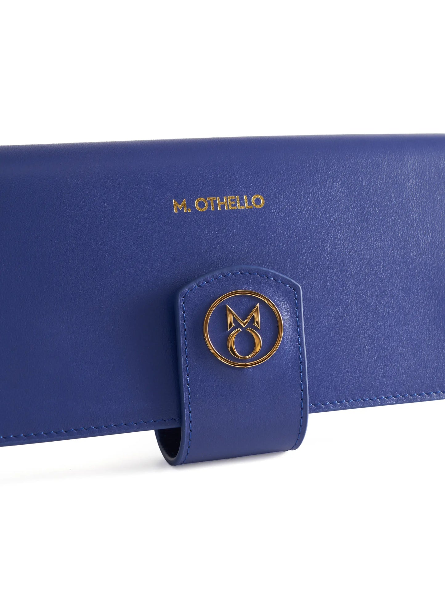 Cobalt Blue leather wallet with 'M. Othello' branding on a light background