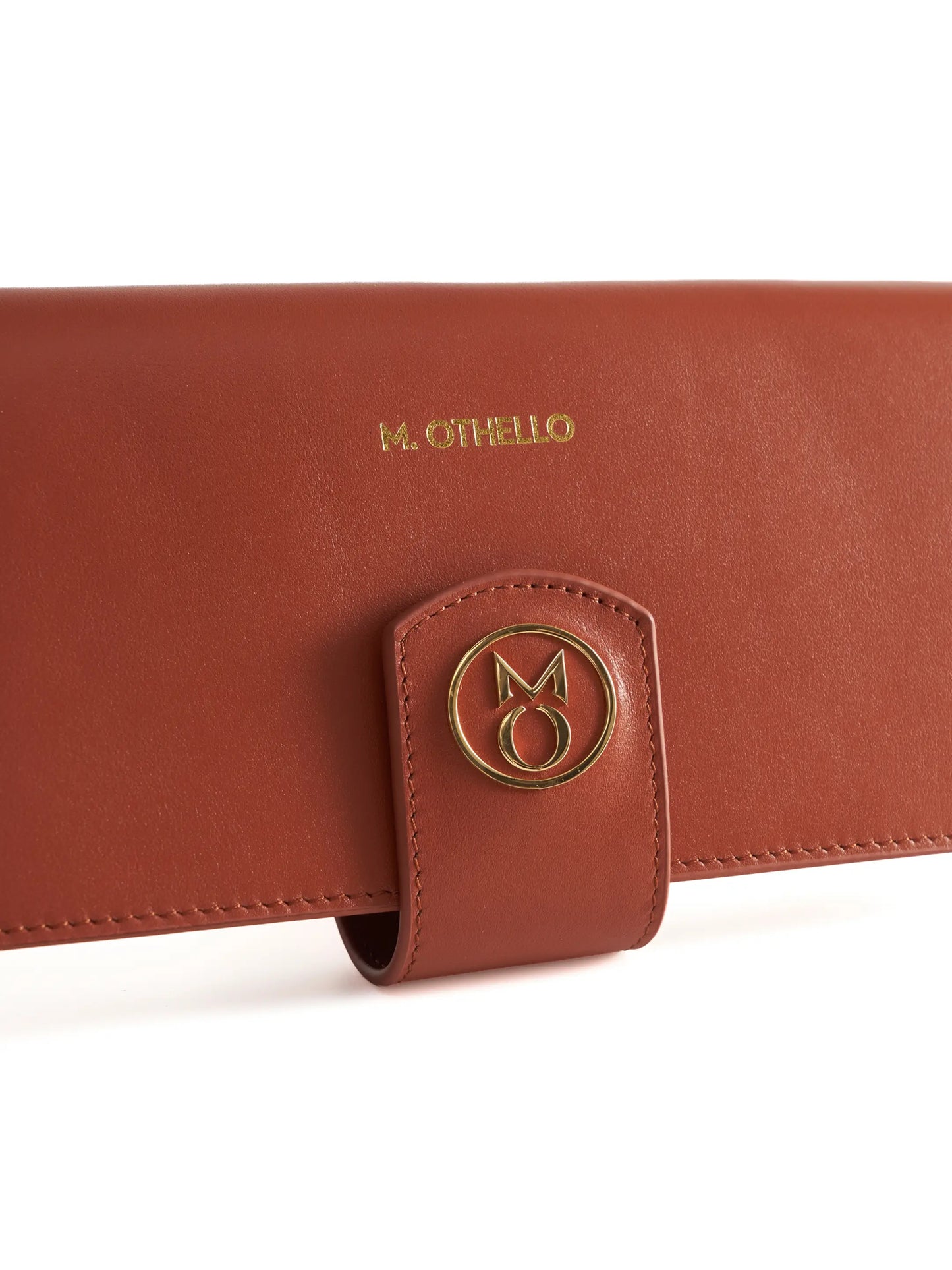 Rust Brown leather wallet with 'M. Othello' branding on a light background