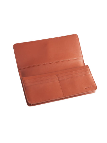 Rust Brown leather wallet with 'M. Othello' branding on a light background