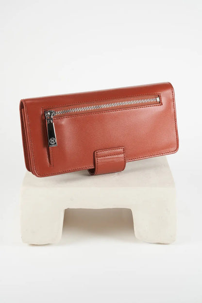 Brown leather phone wallet on a white stand with a white background