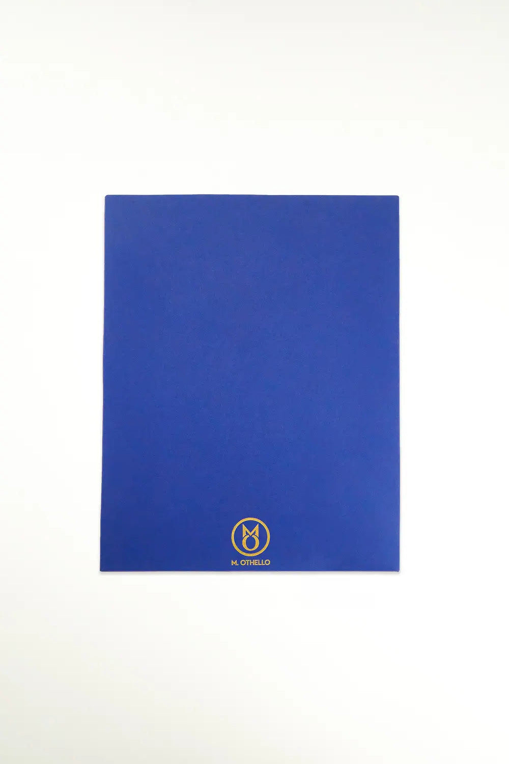 Blue leather mousepad with 'M. Othello' logo on a light background