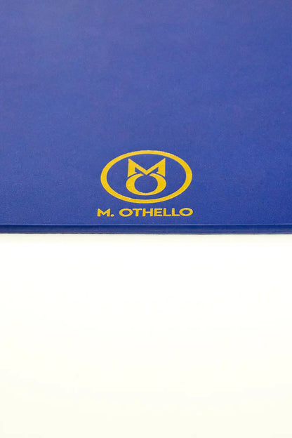 Blue leather mousepad with 'M. Othello' logo on a light background
