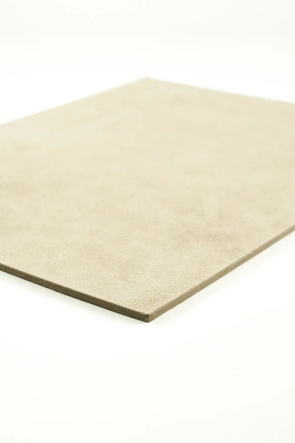 Gray leather mousepad with 'M. Othello' logo on a light background